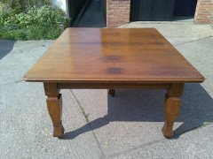 Shapland and Petter. An Arts and Crafts oak 14 seater extending dining table with three leaves and eight matching chairs - Thumbnail 3