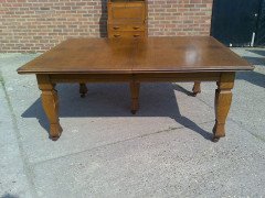 Shapland and Petter. An Arts and Crafts oak 14 seater extending dining table with three leaves and eight matching chairs - Thumbnail 4