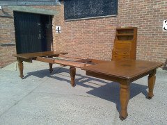 Shapland and Petter. An Arts and Crafts oak 14 seater extending dining table with three leaves and eight matching chairs - Thumbnail 5