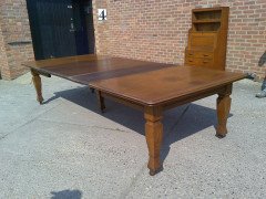 Shapland and Petter. An Arts and Crafts oak 14 seater extending dining table with three leaves and eight matching chairs - Thumbnail 6