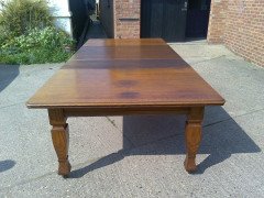 Shapland and Petter. An Arts and Crafts oak 14 seater extending dining table with three leaves and eight matching chairs - Thumbnail 7