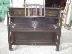 Walter Cave for Bechstein. A dark oak with an overstrung upright underdamper action - Thumbnail 1