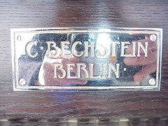 Walter Cave for Bechstein. A dark oak with an overstrung upright underdamper action - Thumbnail 3