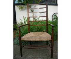 Liberty and Co. A rush seated ladder back armchair - Thumbnail 1