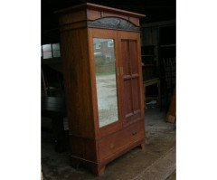 An Arts and Crafts oak double wardrobe and dressing table in the Glasgow Style - Thumbnail 1