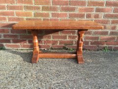 An Arts Crafts oak adzed coffee table with mouse running up the leg - Thumbnail 1
