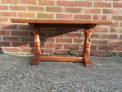 An Arts Crafts oak adzed coffee table with mouse running up the leg - Thumbnail 2