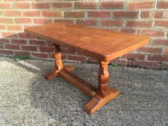 An Arts Crafts oak adzed coffee table with mouse running up the leg - Thumbnail 3