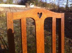 A fourteen seat Arts and Crafts oak 'D' end extending dining table with four extra leaves. - Thumbnail 12