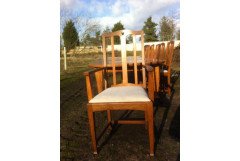 A fourteen seat Arts and Crafts oak 'D' end extending dining table with four extra leaves. - Thumbnail 13