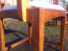A fourteen seat Arts and Crafts oak 'D' end extending dining table with four extra leaves. - Thumbnail 19