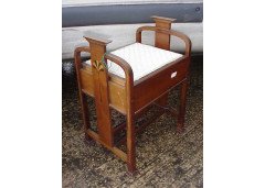 Liberty and Co (attributed). An Arts and Crafts walnut piano stool - Thumbnail 1