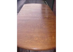An Arts and Crafts 'round ended' wind-out extending dining table - Thumbnail 2