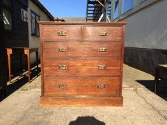 An Arts and Crafts oak chest of drawers with good stylised copper handles - Thumbnail 1