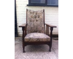 An Arts and Crafts oak reclining armchair with large flat extended arms - Thumbnail 1