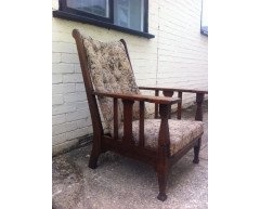 An Arts and Crafts oak reclining armchair with large flat extended arms - Thumbnail 2