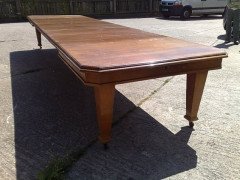 Wylie and Lochhead. A rare 16 foot long Arts and Crafts oak extending dining table with six original leaves - Thumbnail 9