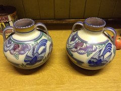 Poole Pottery. A pair of vases with prancing deer and colourful floral detail. - Thumbnail 4