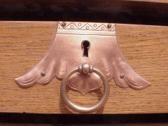An Arts and Crafts oak sideboard with engraved copper metalwork - Thumbnail 12