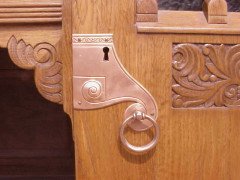 An Arts and Crafts oak sideboard with engraved copper metalwork - Thumbnail 18