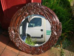 A large Arts and Crafts oak mirror with floral carving of superior craftsmanship. - Thumbnail 3