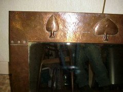 Liberty and Co. A copper mirror with hand formed stylised tree designs after a design by C F A Voysey - Thumbnail 2