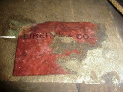 Liberty and Co. A copper mirror with hand formed stylised tree designs after a design by C F A Voysey - Thumbnail 3