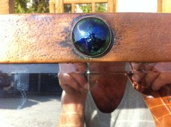 Liberty and Co. An Arts and Crafts copper mirror with blue enamel roundel - Thumbnail 4