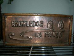 A wonderful Arts and Crafts oak book trough with copper panel - Thumbnail 1