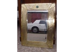 Liberty and Co. A large Arts and Crafts brass mirror with Ruskin roundels. - Thumbnail 1