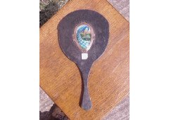 A vanity mirror with an enamelled stylised Peacock to the back and an enamelled letter amongst green heart shaped leaves. - Thumbnail 1