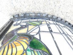 A stunning bow fronted stained glass Peacock panel in its original window frame - Thumbnail 10