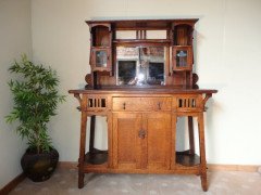 Wylie and Lochhead. An unusual Arts and Crafts oak sideboard attributed - Thumbnail 1