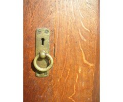 A quality tall Arts and Crafts oak cupboard with central bevelled mirror - Thumbnail 3