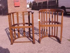An Arts and Crafts oak tub chair - Thumbnail 1