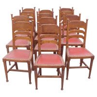 William Birch for Liberty & Co., A Set of Sixteen Arts & Crafts Oak Dining Chairs