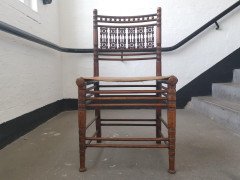 Liberty & Co. A Moorish Walnut Side Chair with Thebes Style Slung Leather Seat - Thumbnail 2