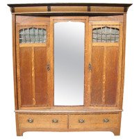 Gillow and Co. – Arts & Crafts Oak Treble Wardrobe with Ebony Floral Inlays