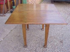 Arts & Crafts Oak swivel and fold over dining table with cutlery drawer - Thumbnail 4