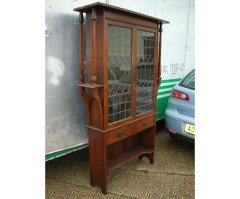 Liberty & Co. an Arts & Crafts Oak Glazed Bookcase with Stylized Heart Details - Thumbnail 2