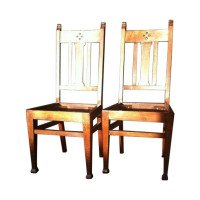 Wylie & Lochhead, attributed. A Pair of Glasgow School Arts & Crafts Oak Dining Chairs