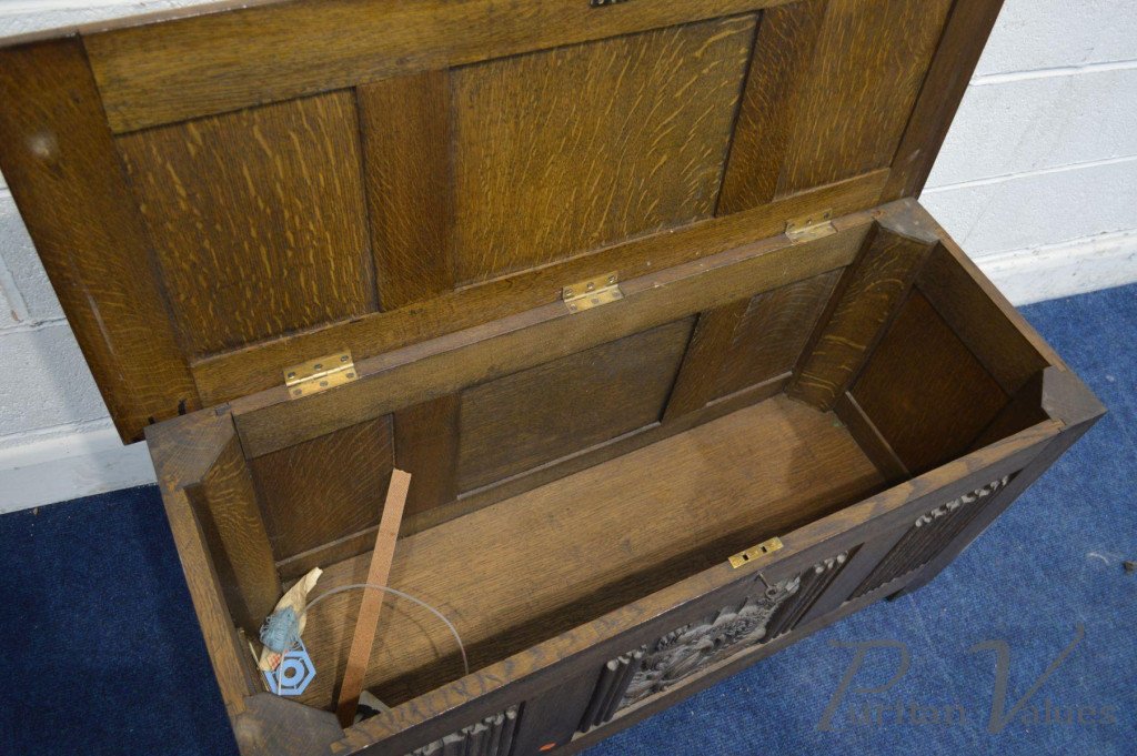 Oak_Blanket_Chest_with_linenfold_panels_to_all_sides_carved_dragons_to_the_top_and_front_date_reading_1938_two_initials_to_the_lid_W112cm_D46cm_H56cm7_master