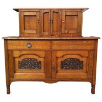 George Walton Style of a Small Arts & Crafts Oak Sideboard with Floral Carvings