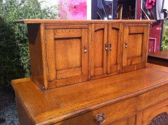 George Walton Style of a Small Arts & Crafts Oak Sideboard with Floral Carvings - Thumbnail 4