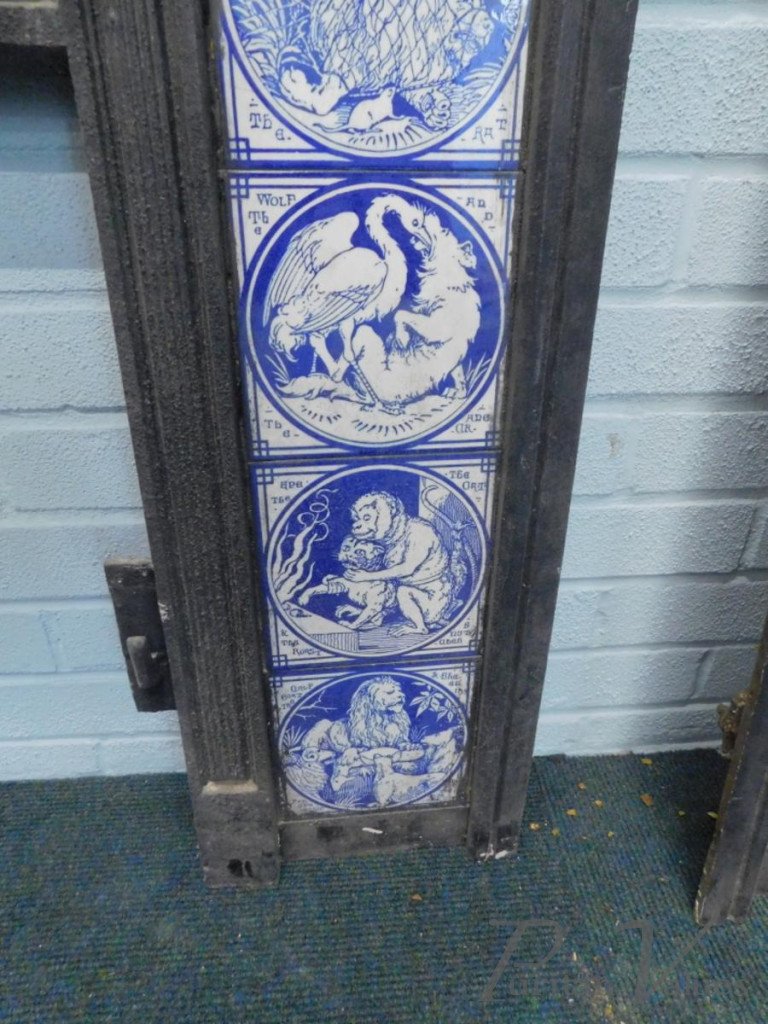 Aesthetic_cast_iron_fire_inserts_each_with_twelve_Minton_tiles_printed_in_blue_with_a_design_of_Aesops_Fables_by_Moyr_Smith_H97cm_W97_5cm1_master