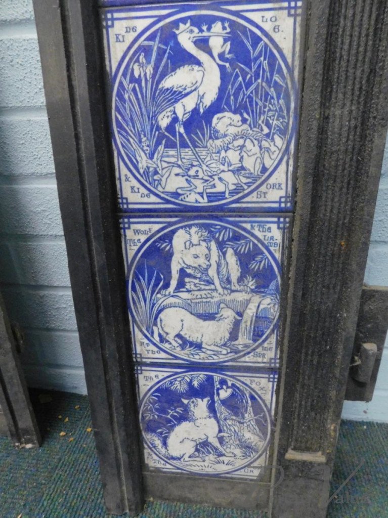 Aesthetic_cast_iron_fire_inserts_each_with_twelve_Minton_tiles_printed_in_blue_with_a_design_of_Aesops_Fables_by_Moyr_Smith_H97cm_W97_5cm4_master