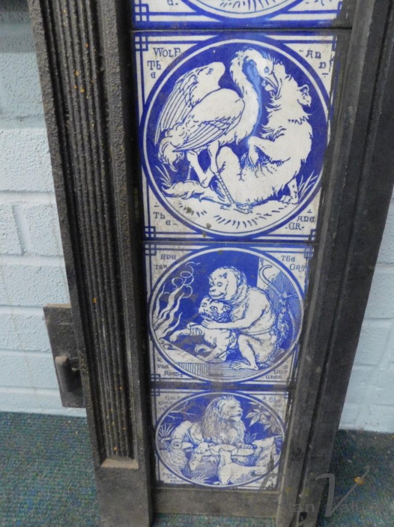 Aesthetic_cast_iron_fire_inserts_each_with_twelve_Minton_tiles_printed_in_blue_with_a_design_of_Aesops_Fables_by_Moyr_Smith_H97cm_W97_5cm6_master