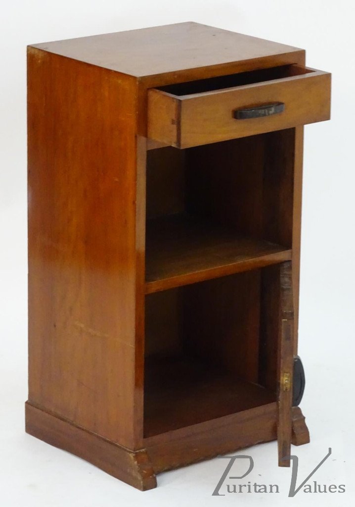 Cotswold_school_bedside_cabinet_with_a_single_short_drawer_with_an_ebonised_handle_above_a_carved_door_on_shaped_feet_with_a_carved_details_14inches_wide_x_12_deep_x_28_high3_master