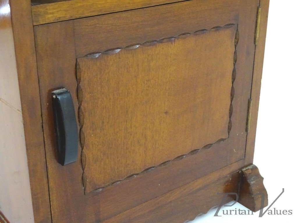 Cotswold_school_bedside_cabinet_with_a_single_short_drawer_with_an_ebonised_handle_above_a_carved_door_on_shaped_feet_with_a_carved_details_14inches_wide_x_12_deep_x_28_high4_master