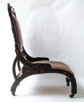 Richard Charles An Aesthetic Movement Ebonized and Parcel Gilt Lounge Chair. - Thumbnail 3